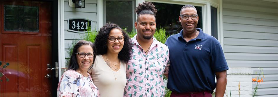 family posing for picture