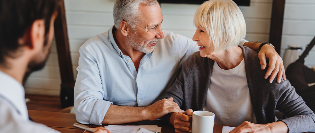Military couple smiling because they have a trust with AWM&T.